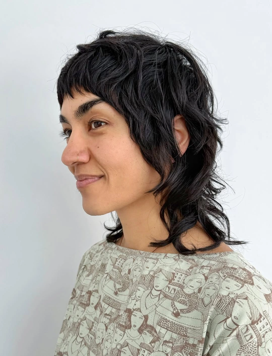 choppy medium layered hair Textured Midnight Shag with Soft Curled Ends