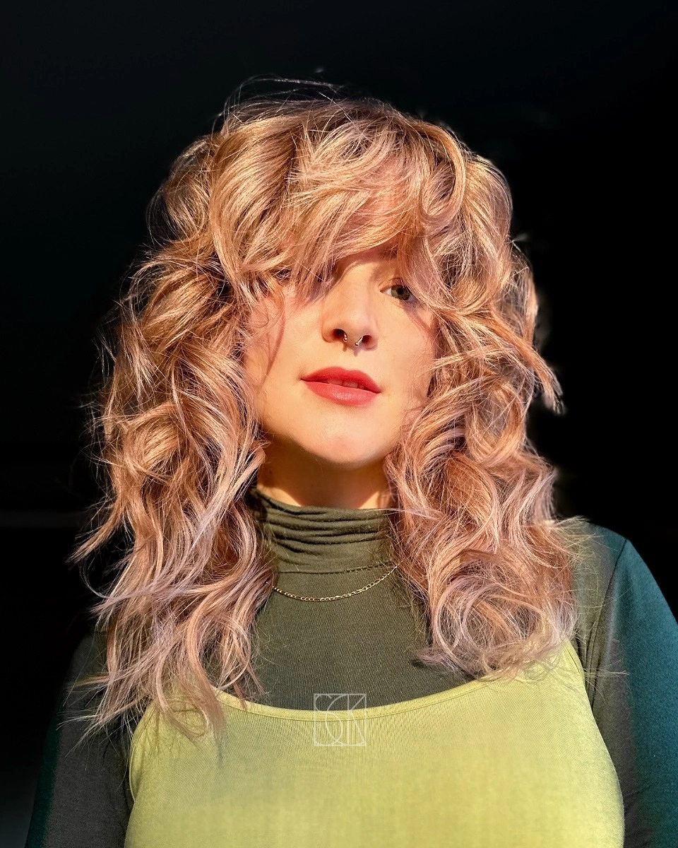 choppy medium layered hair Voluminous Champagne Curls with Layered Drama