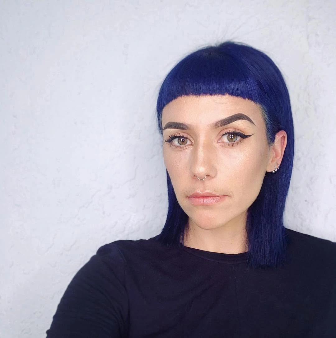 choppy medium layered hair Graphic Midnight Bob with Precision Fringe