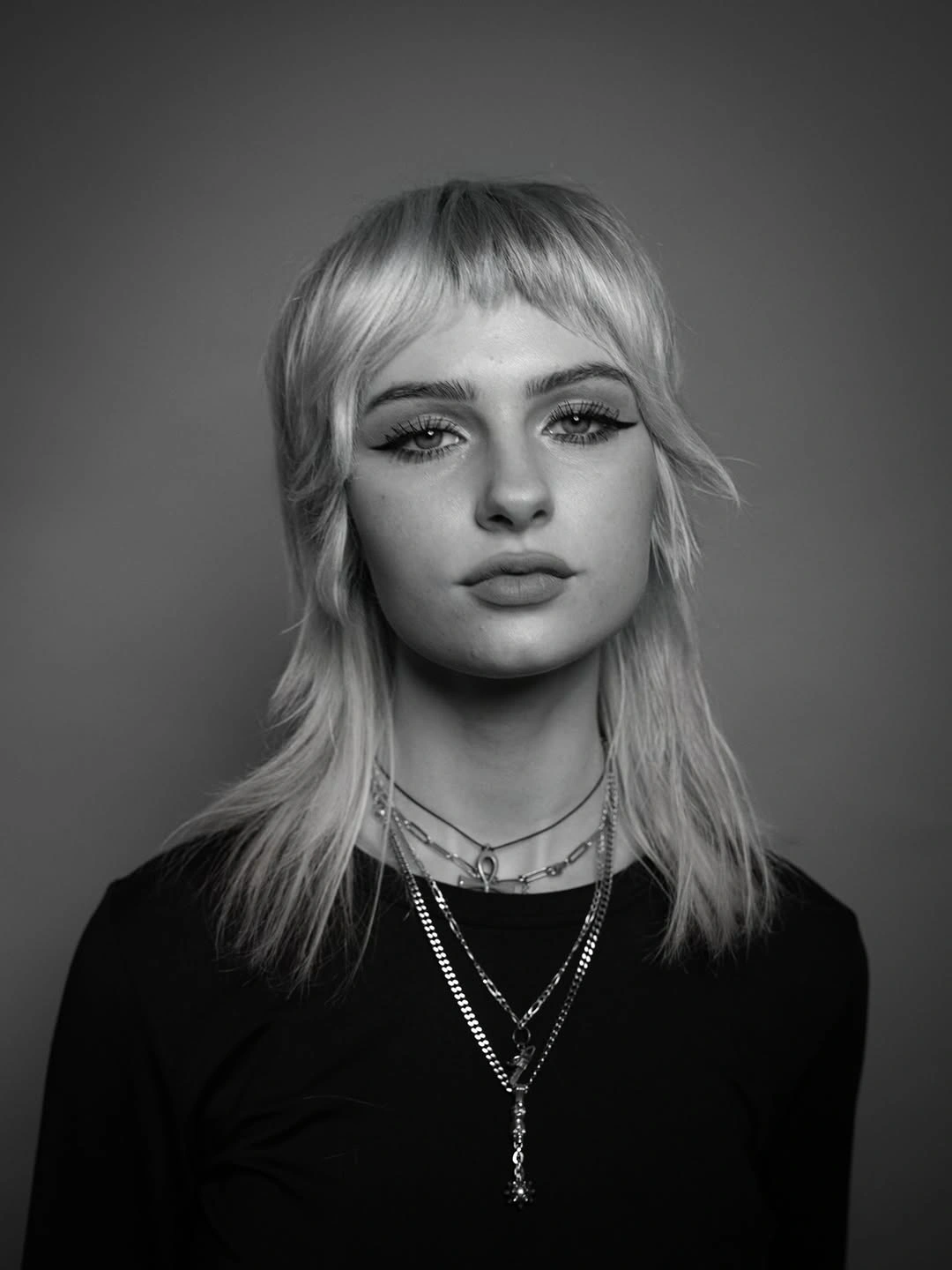 choppy medium layered hair Soft Platinum Wolf Layers with Vintage Edge