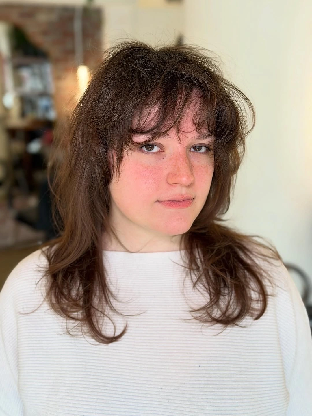 choppy medium layered hair Relaxed Chocolate Layers with Airy Curtain Movement
