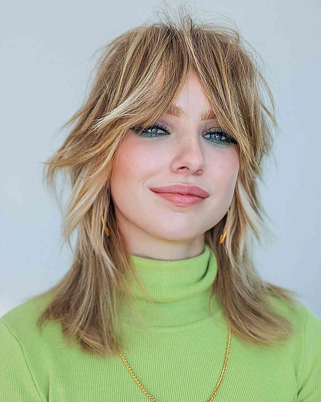 choppy medium layered hair Feathered Blonde Layers with Soft Curtain Flow