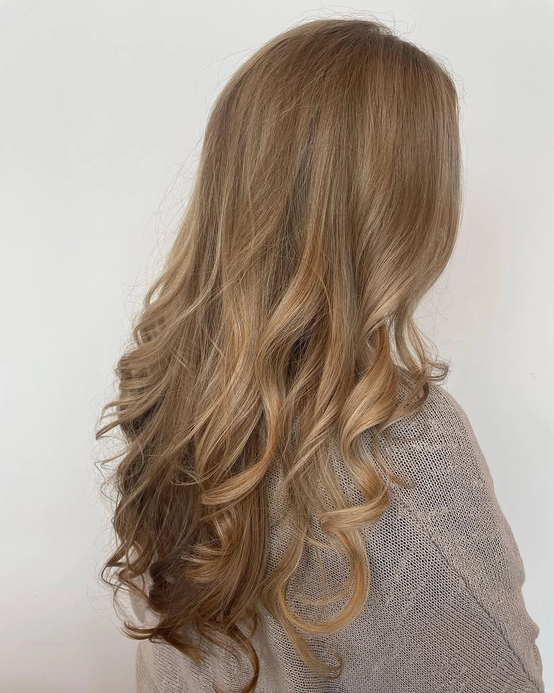 dirty blonde hair color Soft Champagne Dirty Blonde With Romantic Cascading Waves