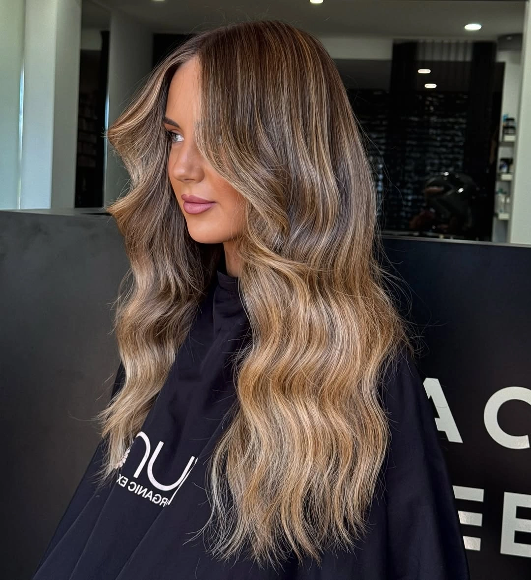 dirty blonde hair color Smoky Dirty Blonde Balayage With Luxurious Dimension