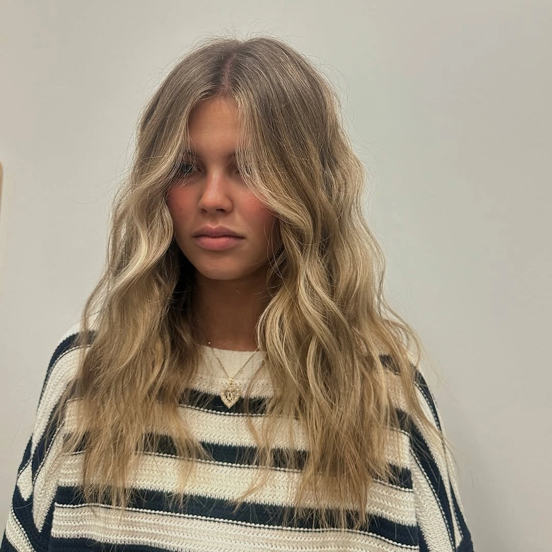 dirty blonde hair color Natural Beachy Dirty Blonde With Relaxed Texture
