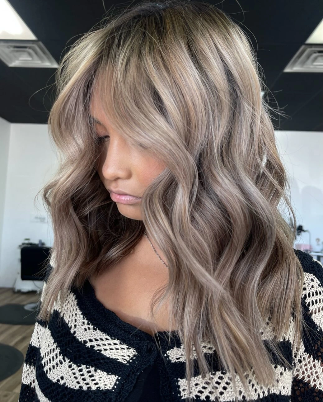 dirty blonde hair color Ash Mushroom Dirty Blonde With Soft Curtain Layers