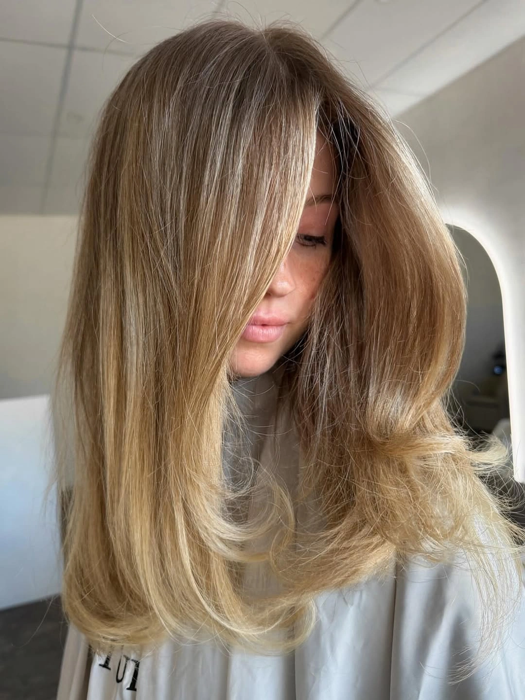 dirty blonde hair color Silky Beige Dirty Blonde With a Luxe Blowout