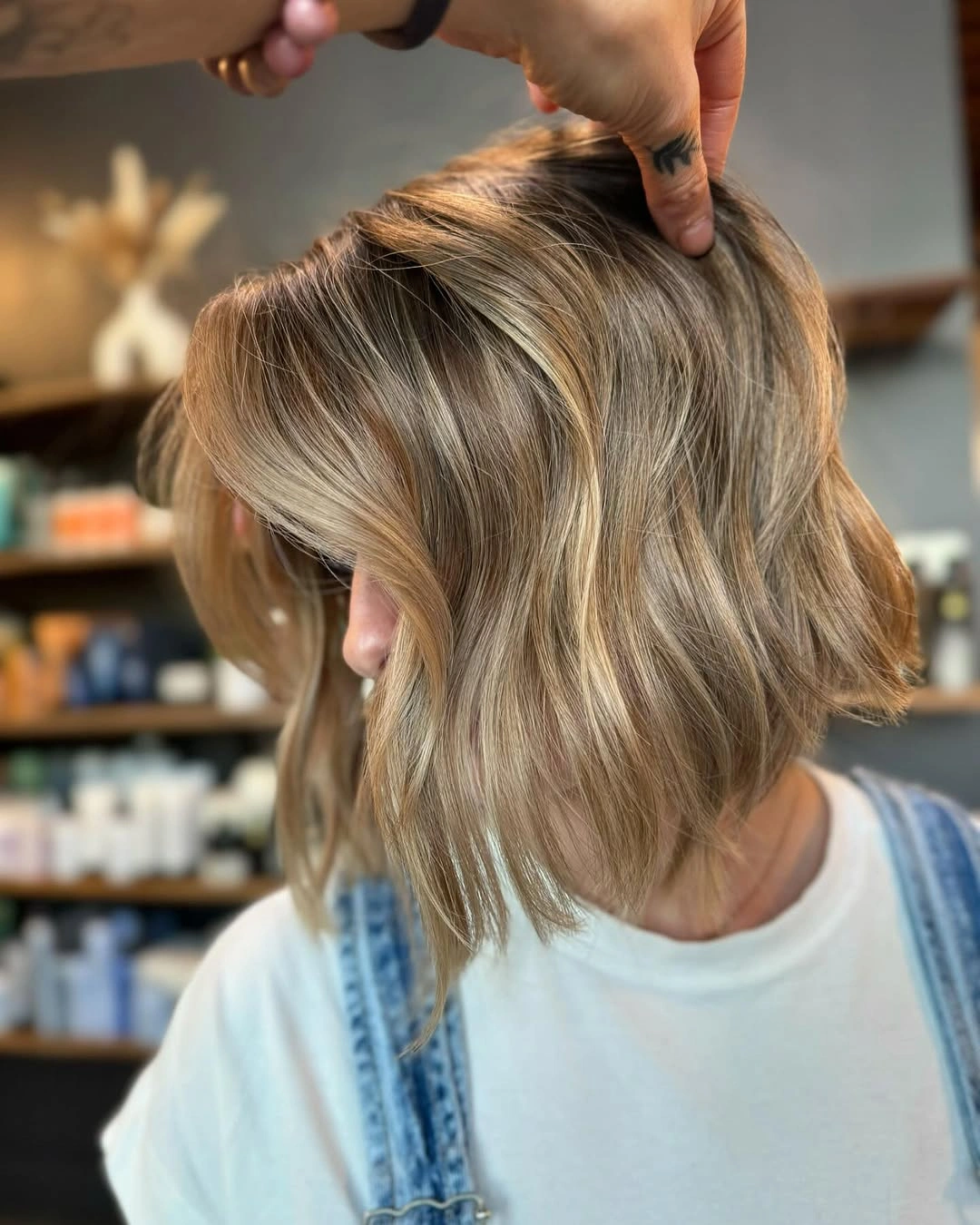dirty blonde hair color Dimensional Dirty Blonde Bob With Face-Framing Brightness