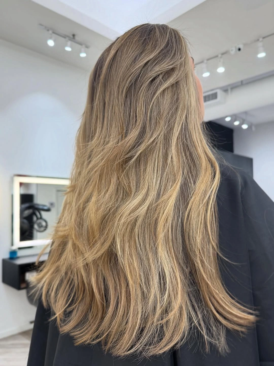 dirty blonde hair color Natural Lived-In Dirty Blonde With Airy Layers