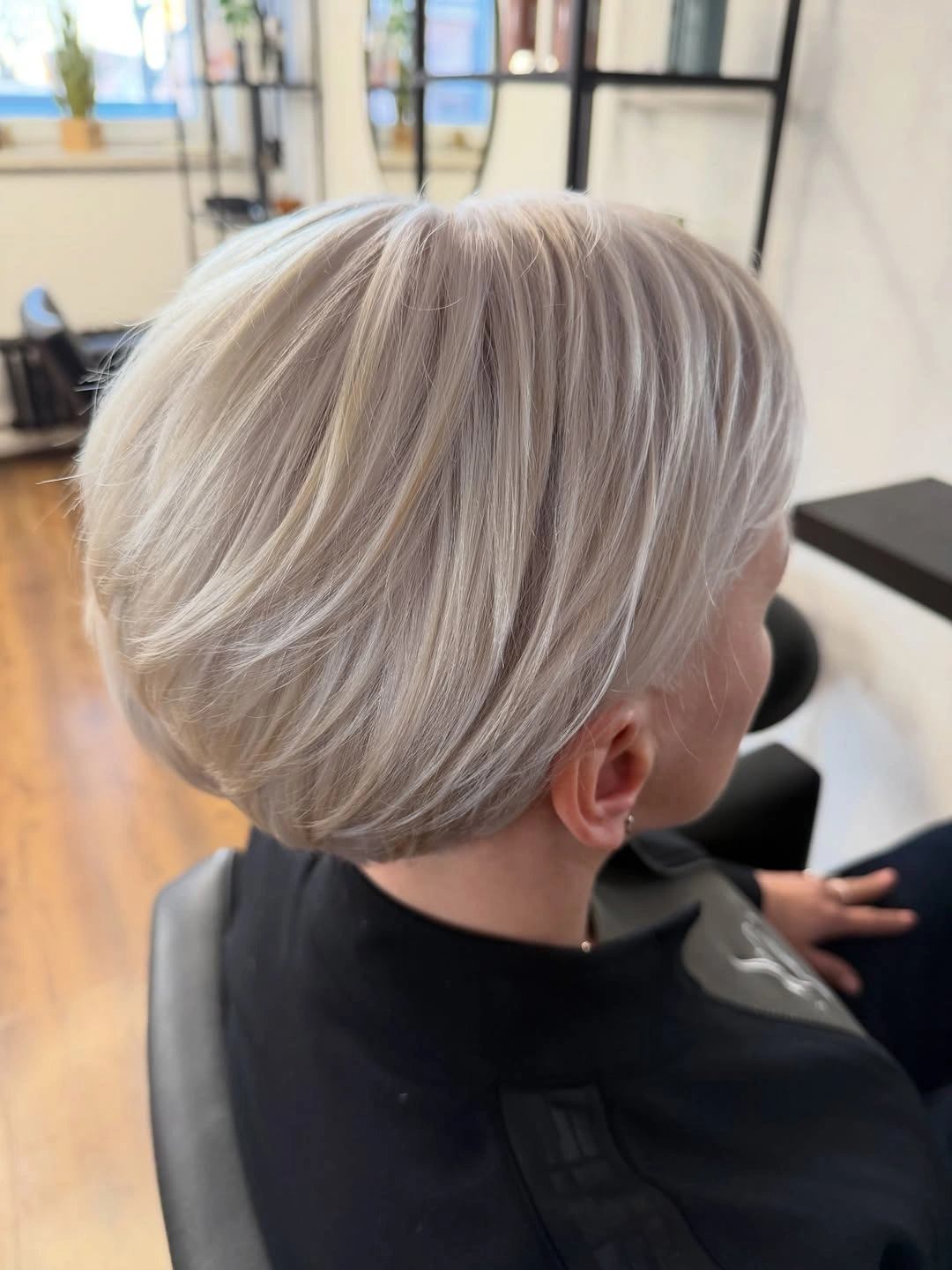 Fall blonde hair colour 2026 Layered Pearl Blonde Pixie Bob With Modern Volume