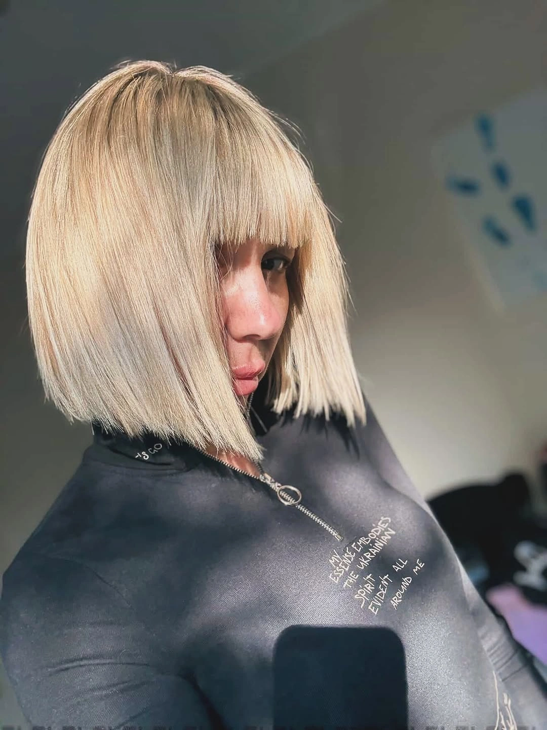 fall bob haircut ideas 2026 Modern Platinum Bob With Architectural Fringe