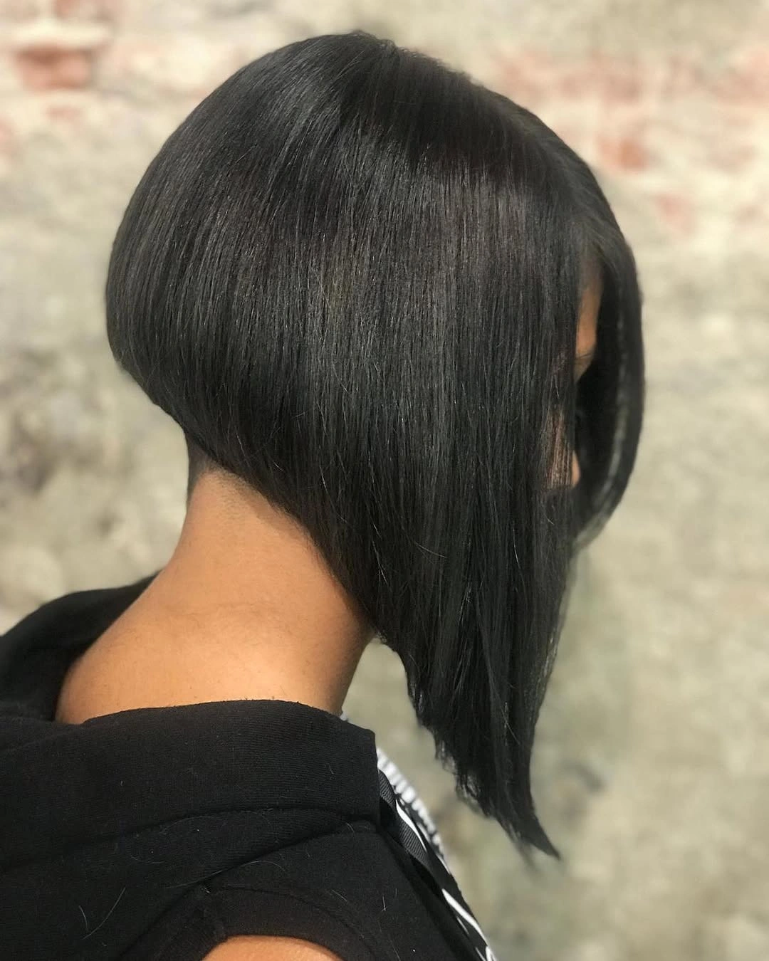 fall bob haircut ideas 2026 Sharp Inverted Bob With Dramatic Contrast