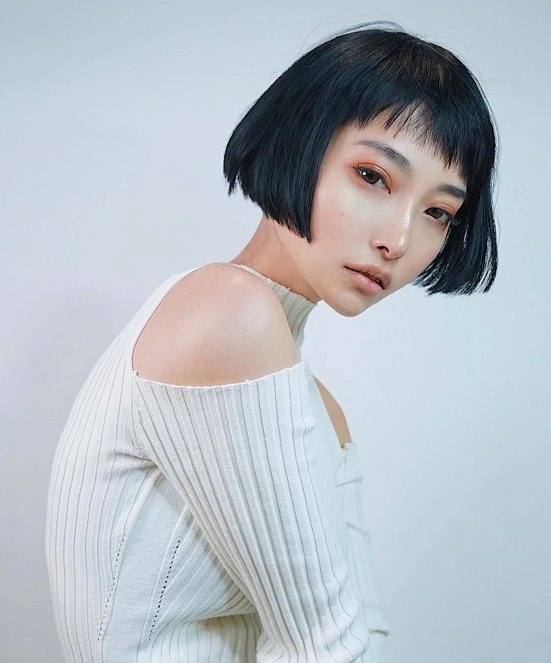 fall bob haircut ideas 2026 Modern Parisian Bob With Wispy Micro Bangs