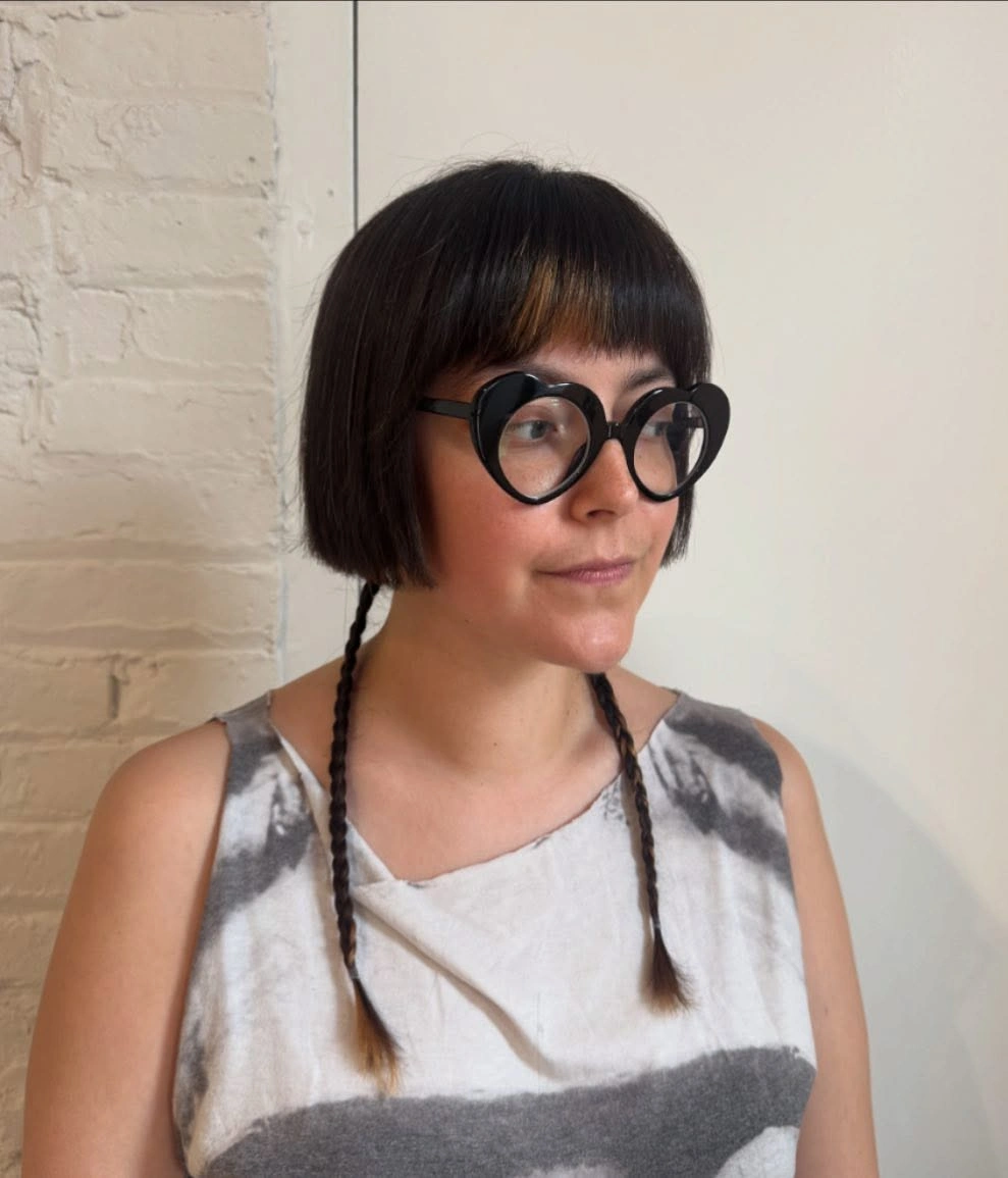 fall bob haircut ideas 2026 Playful Micro Bob With Soft Fringe and Creative Personality