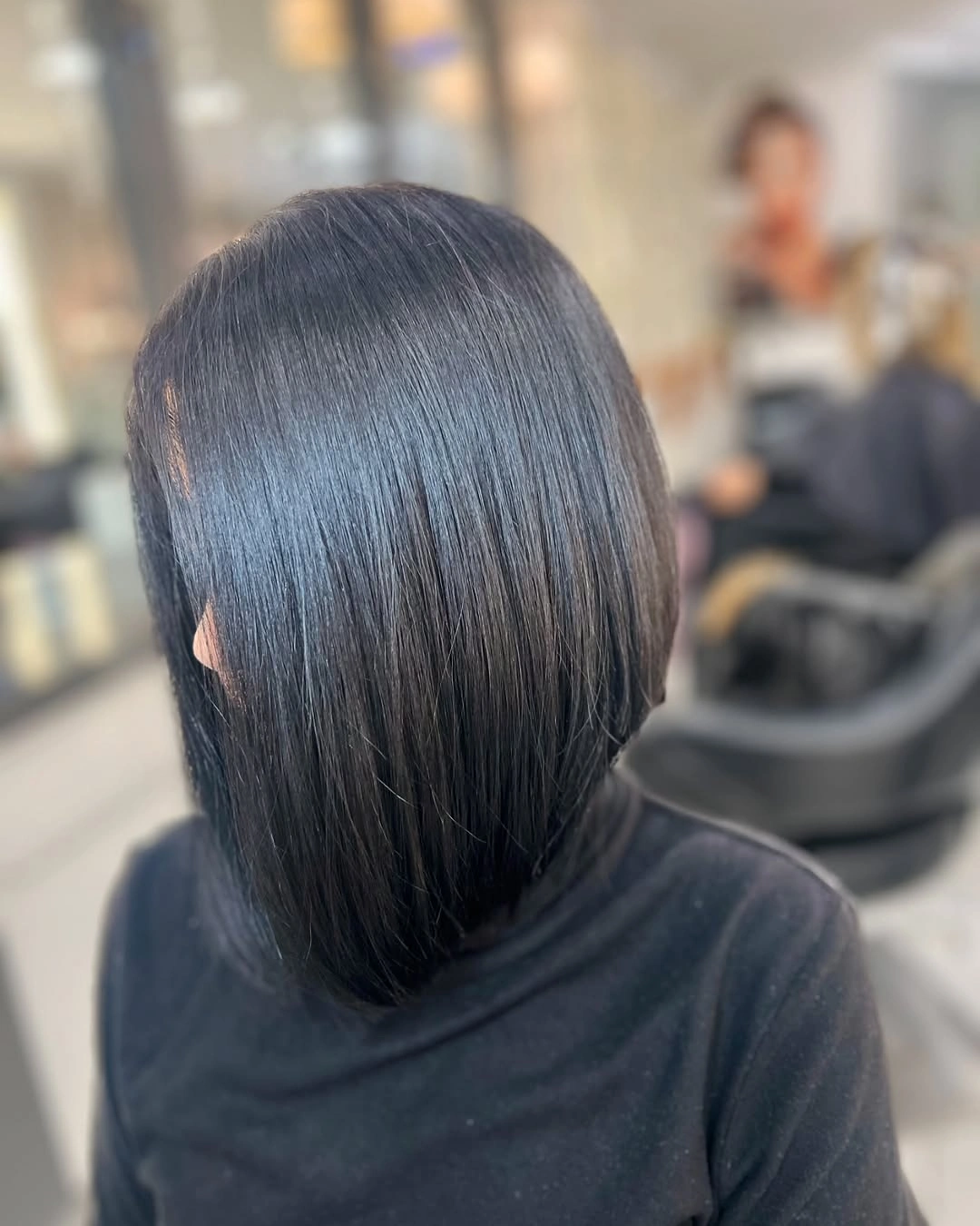 fall bob haircut ideas 2026 Glossy Midnight Bob With Mirror-Like Shine
