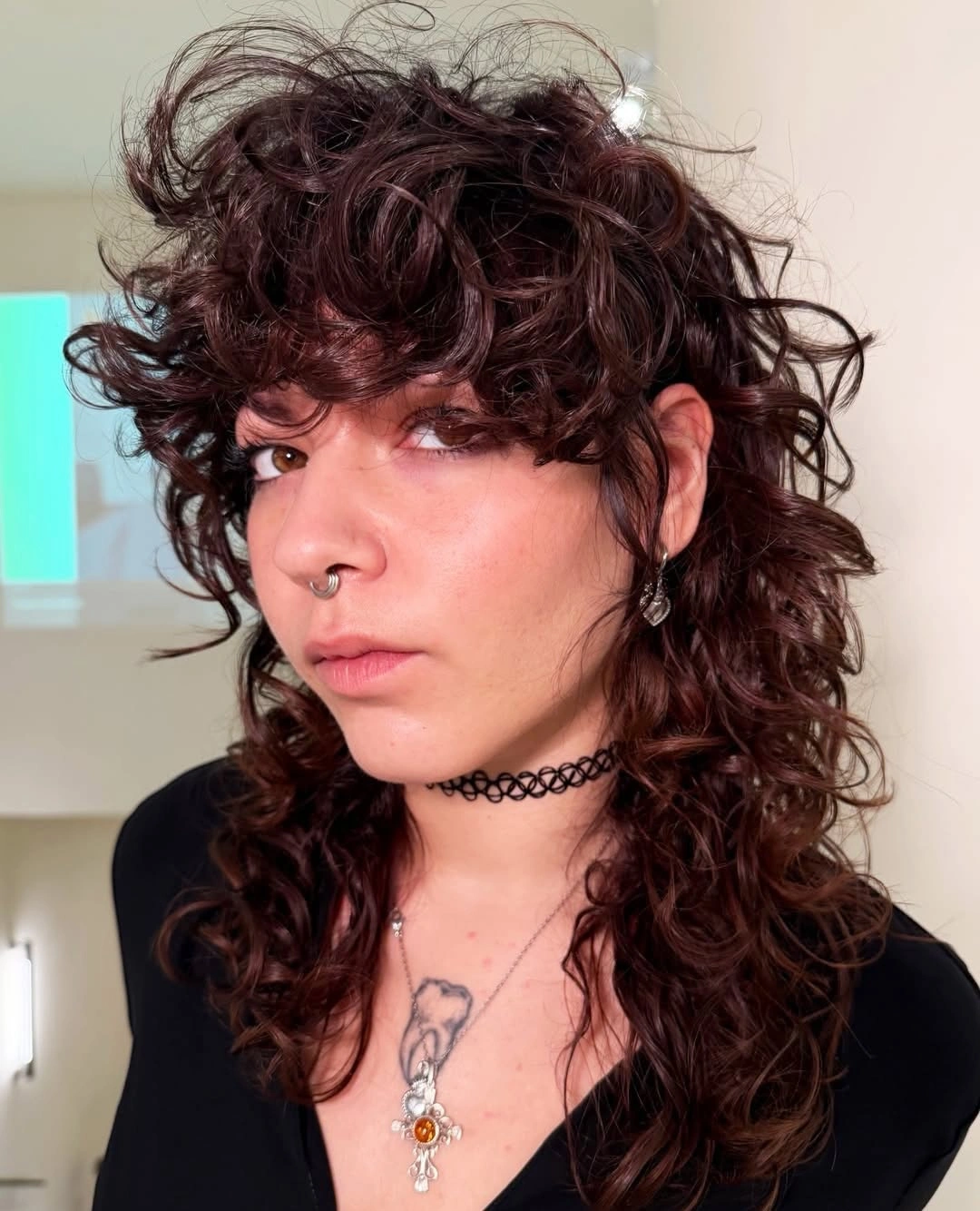 Fall brunette hair colour 2026 Textured Curly Shag in Deep Auburn Brunette