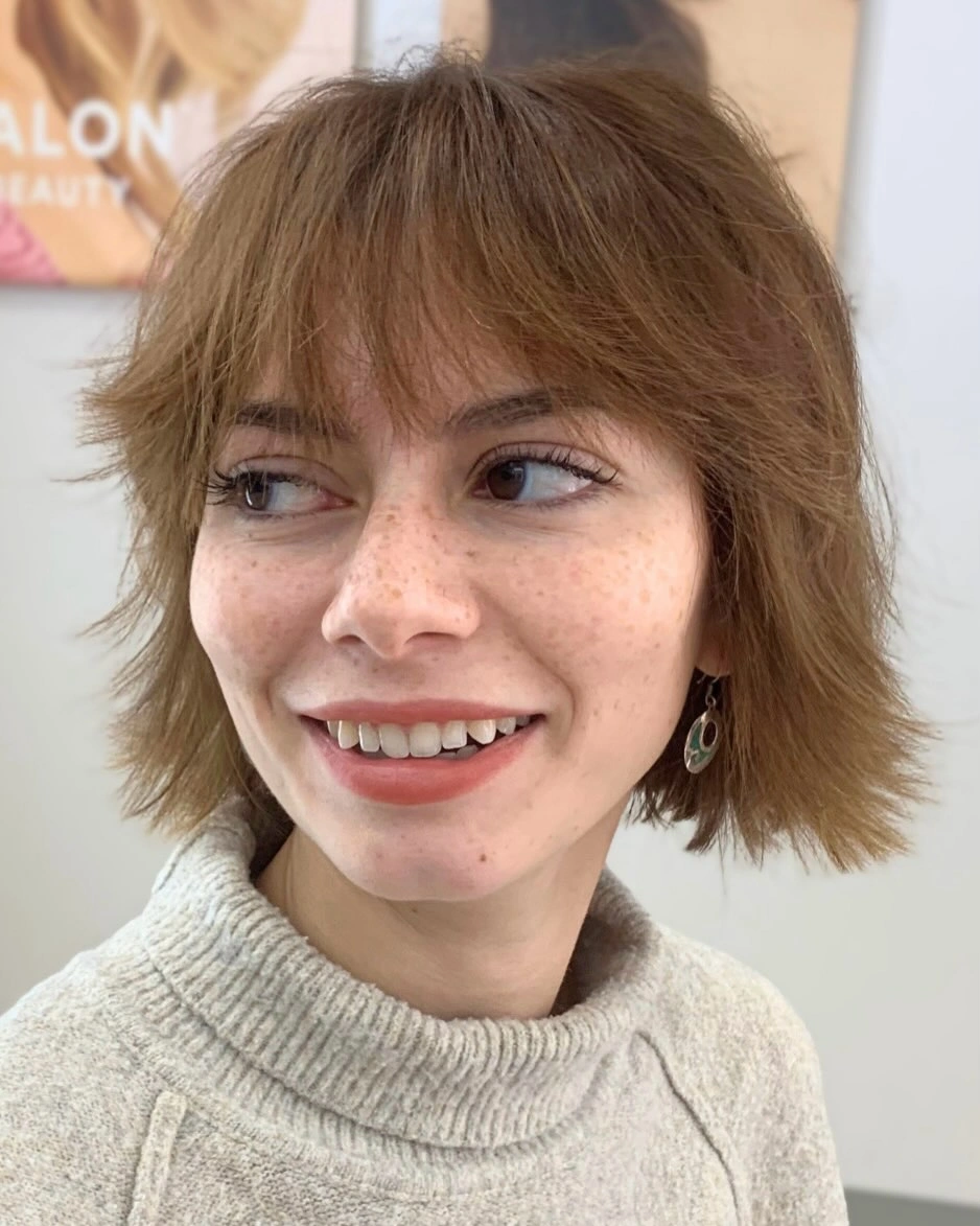 fall French Bob 2026 Feathered French Bob with Wispy Bangs and Soft Layers