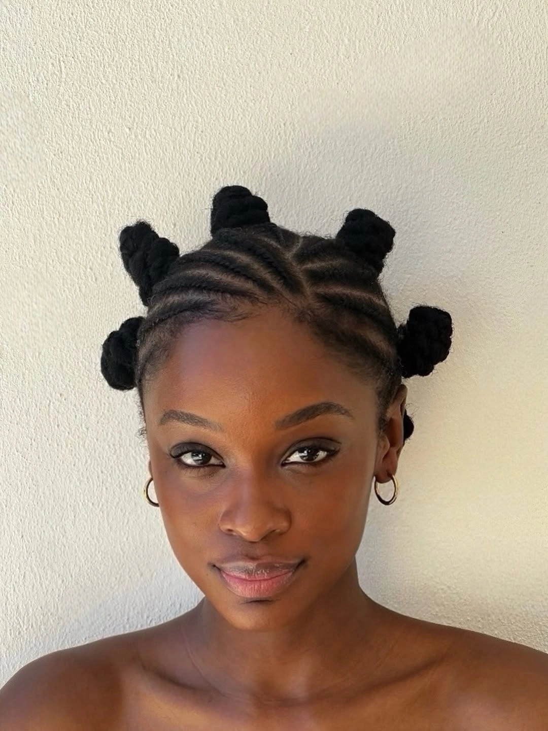 fall hair colors for black women 2026 Classic Bantu Knots With Sleek Protective Partings