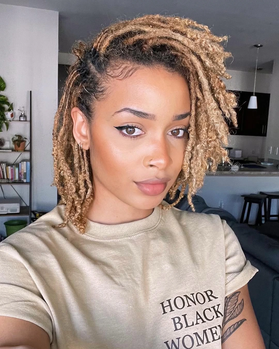fall hair colors for black women 2026 Dimensional Blonde Locs With Effortless Fall Movement