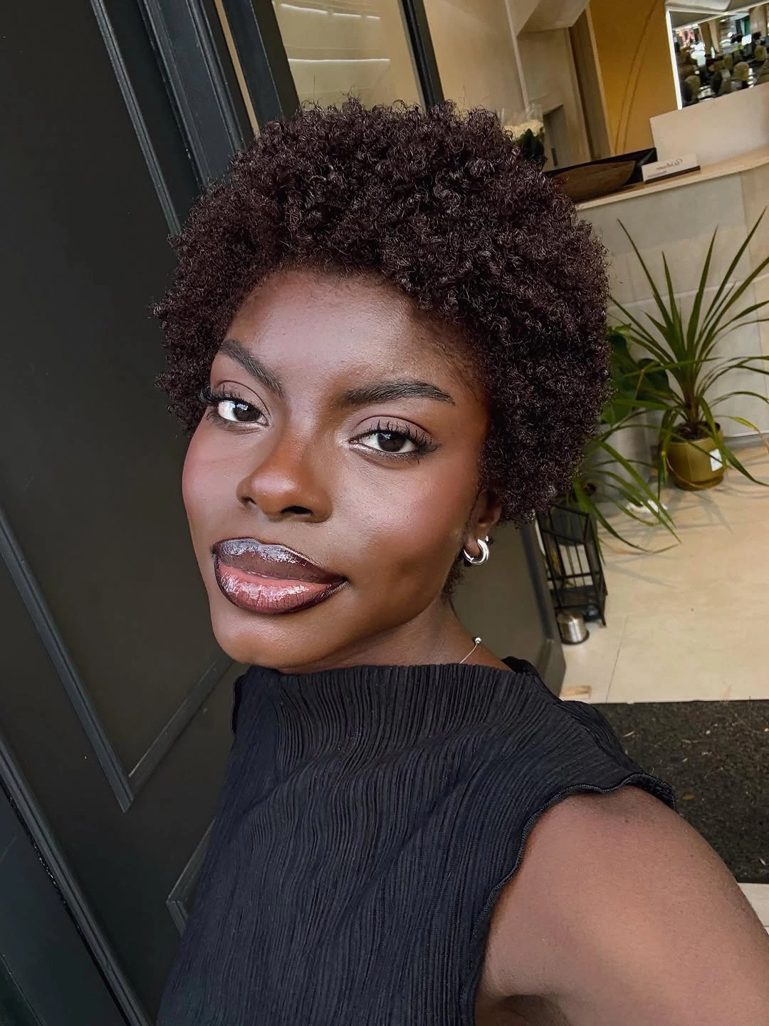 fall hair colors for black women 2026 Rich Espresso Curls With Soft Autumn Depth