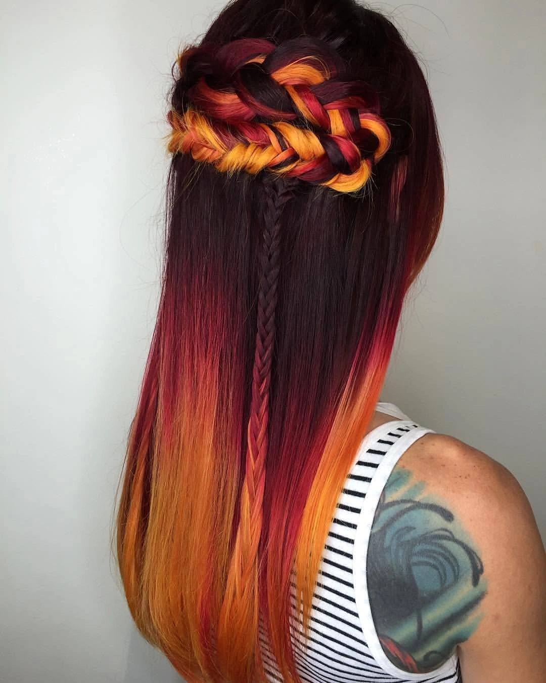 fall hair colour ideas 2026 Bold Sunset Melt With Fiery Braided Details