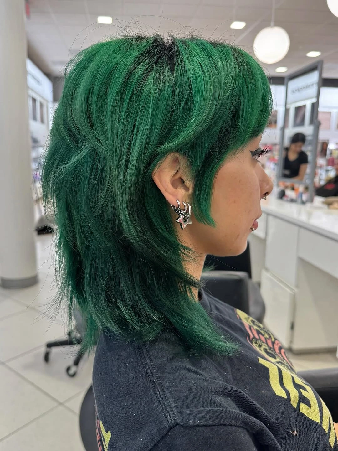 fall haircuts for women 2026 Bold Emerald Wolf Layers That Refuse to Blend In