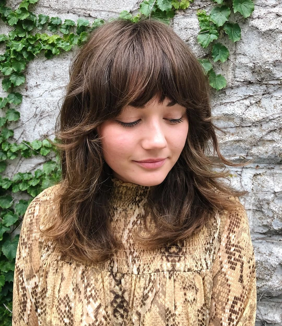 fall haircuts for women 2026 Soft Shag With Feathered Bangs and Vintage Charm