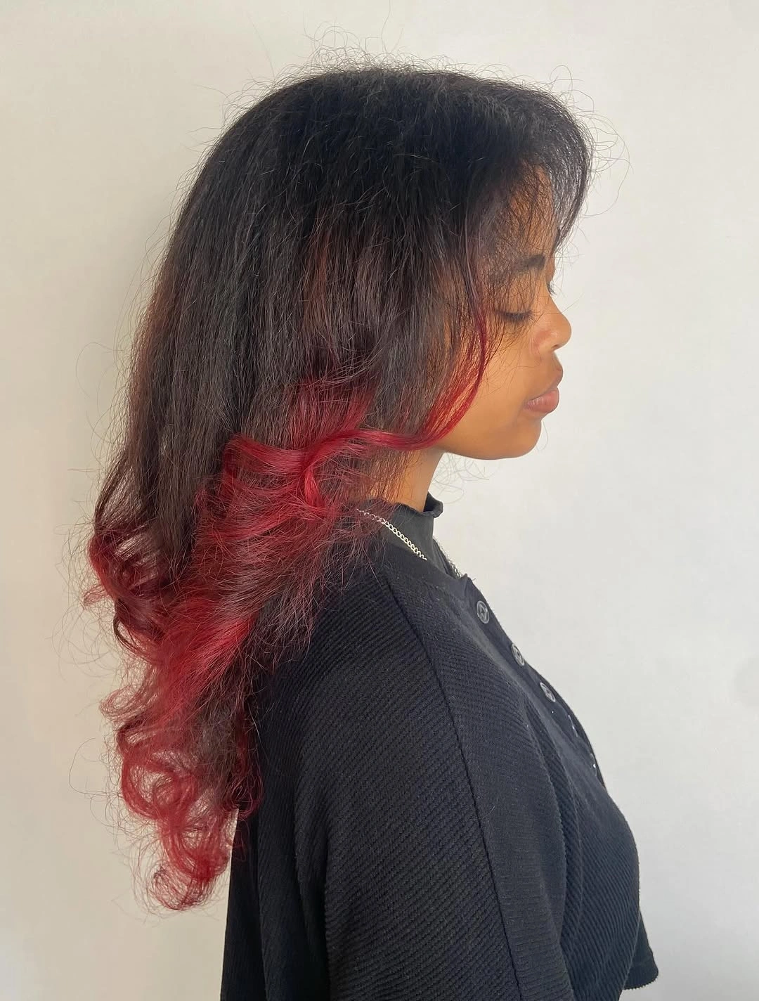 fall haircuts for women 2026 Dimensional Layers With Bold Burgundy Accents