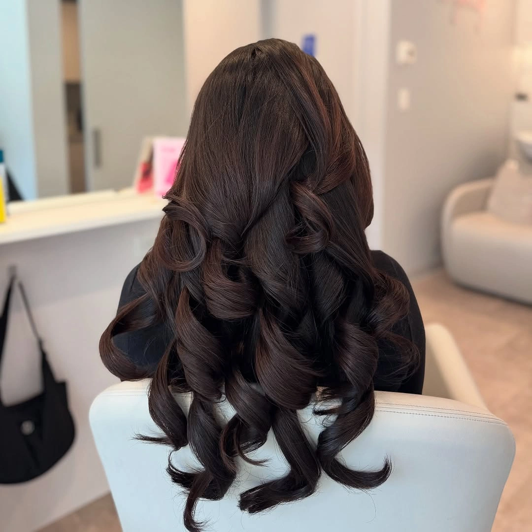 fall hairstyles 2026 Glossy Espresso Waves with a Romantic Half-Up Twist