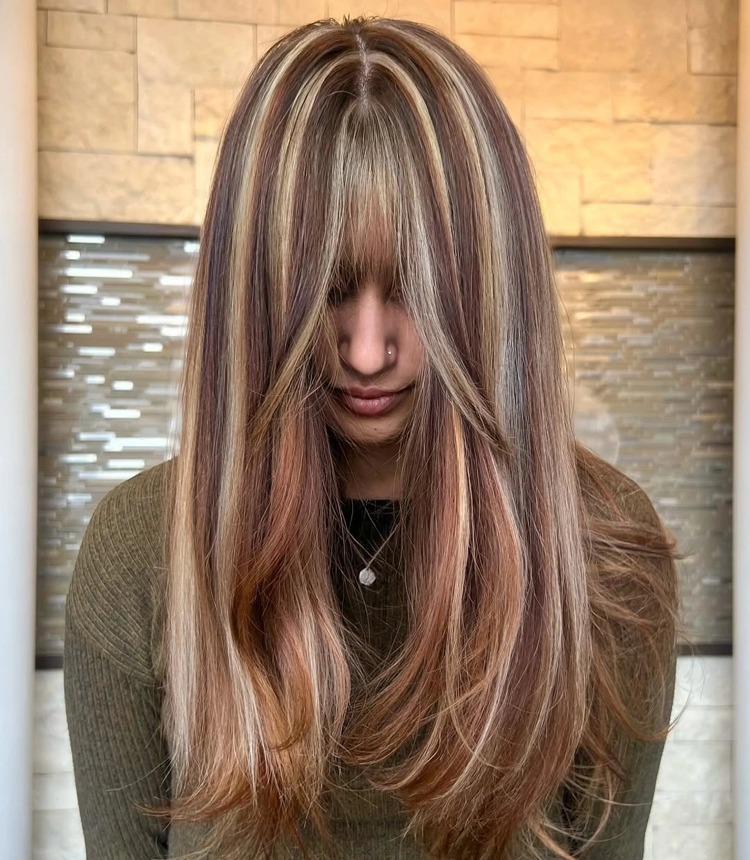 fall hairstyles 2026 Layered Champagne Blonde with Full Curtain Fringe