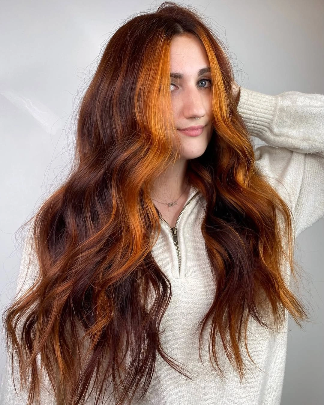 fall hairstyles 2026 Chocolate Waves with Bold Copper Money Pieces