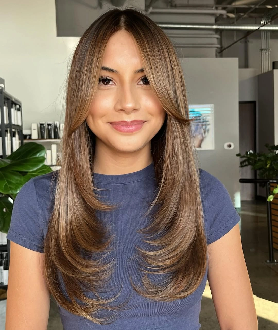 fall hairstyles 2026 Feathered Mid-Length Layers with Soft Face Framing