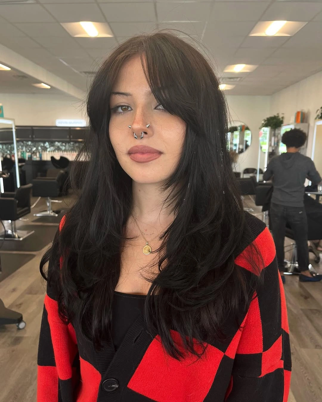 fall hairstyles for long hair 2026 Modern Jet Black Layers With Curtain Fringe