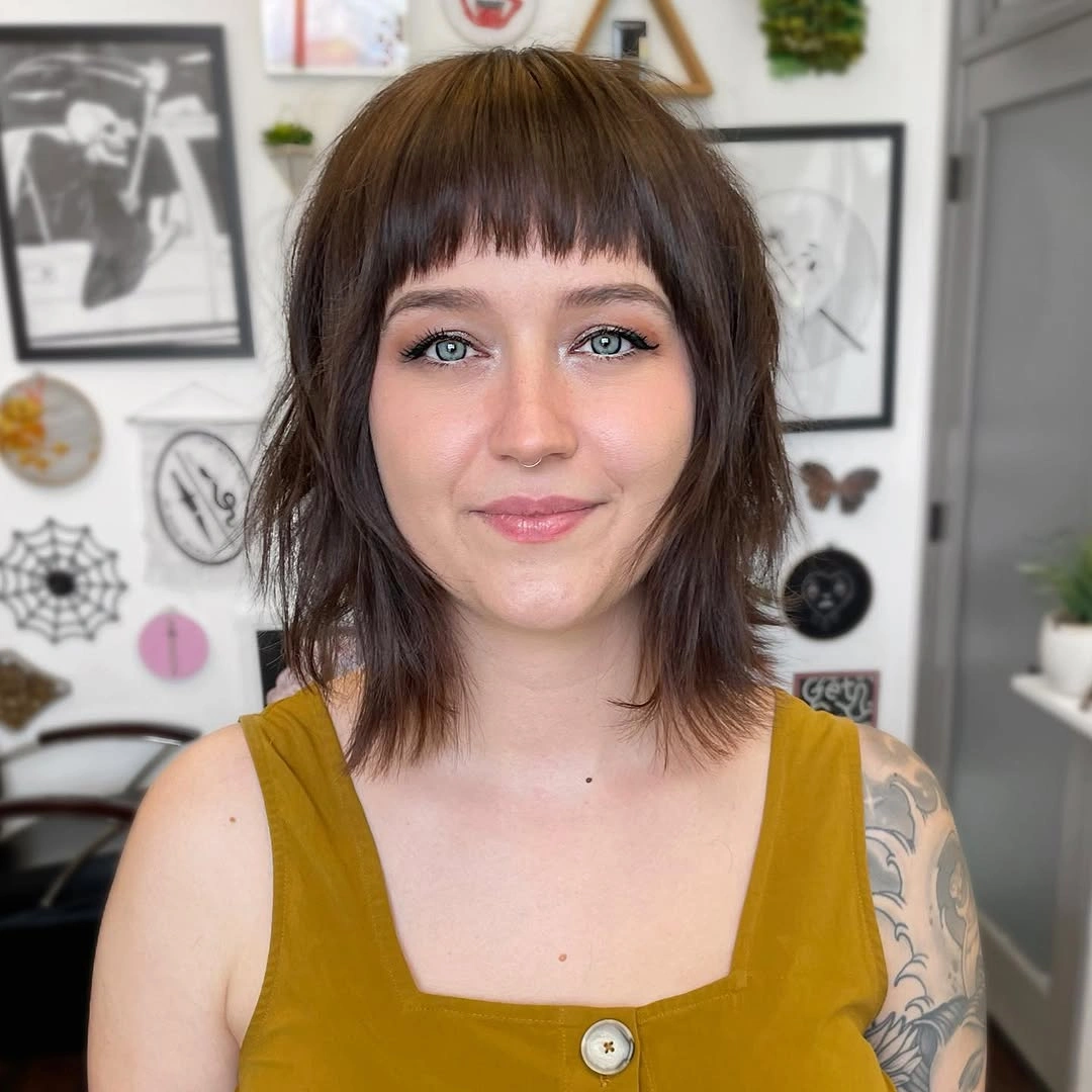 Fall hairstyles for office 2026 Textured French Bob with Soft Micro Bangs