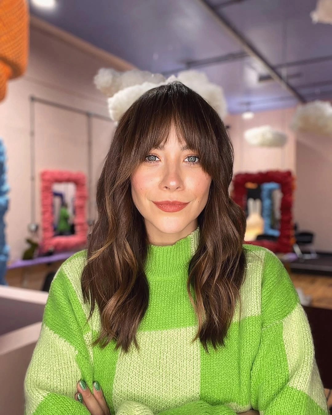 Fall hairstyles for office 2026 Long Layered Waves with Curtain Bangs