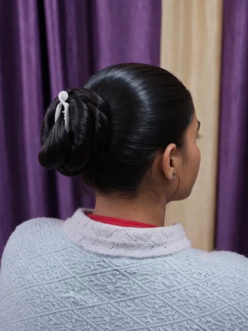 Fall hairstyles for office 2026 Classic Wrapped Bun for Busy Office Days
