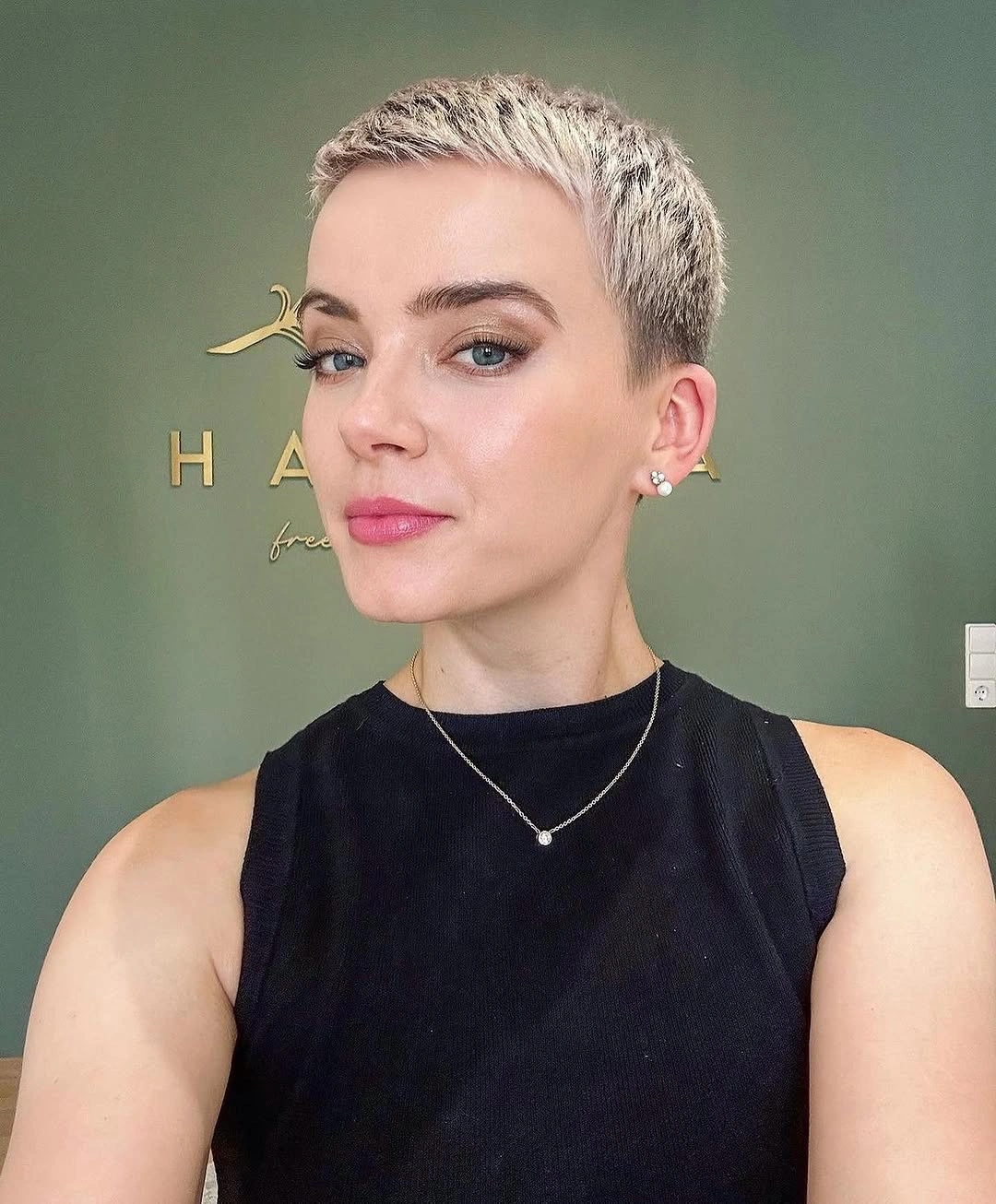 Fall hairstyles for short hair 2026 Modern Silver Buzz Pixie With Chic Confidence