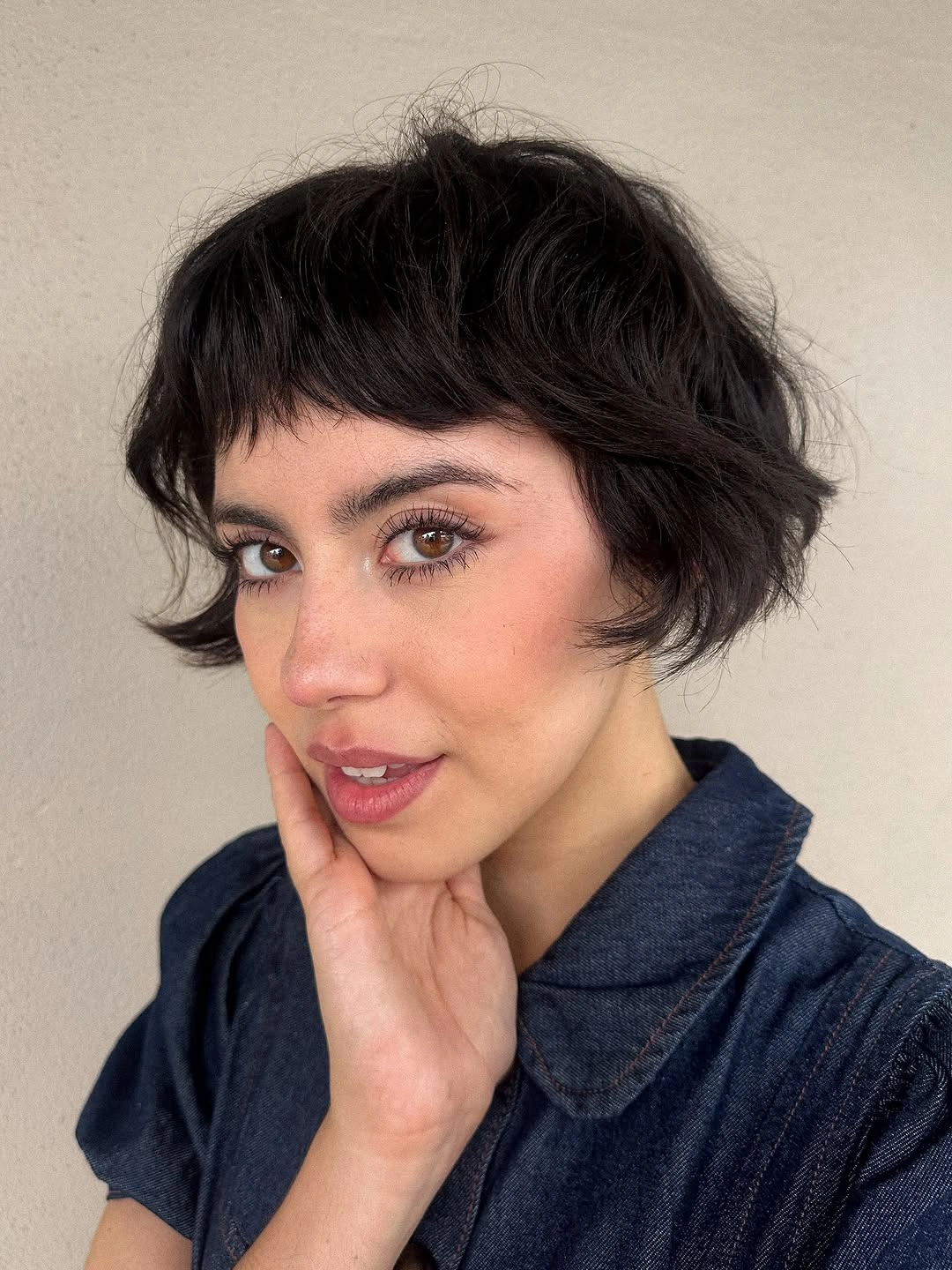 Fall hairstyles for short hair 2026 French-Inspired Micro Bob With Feathered Bangs