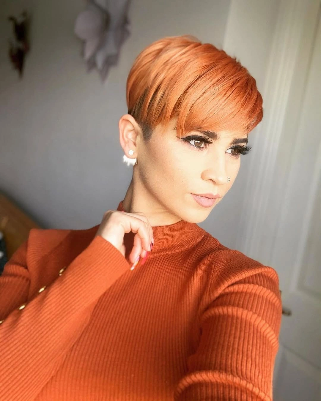 Fall hairstyles for short hair 2026 Copper Pixie With Sleek Side-Swept Fringe