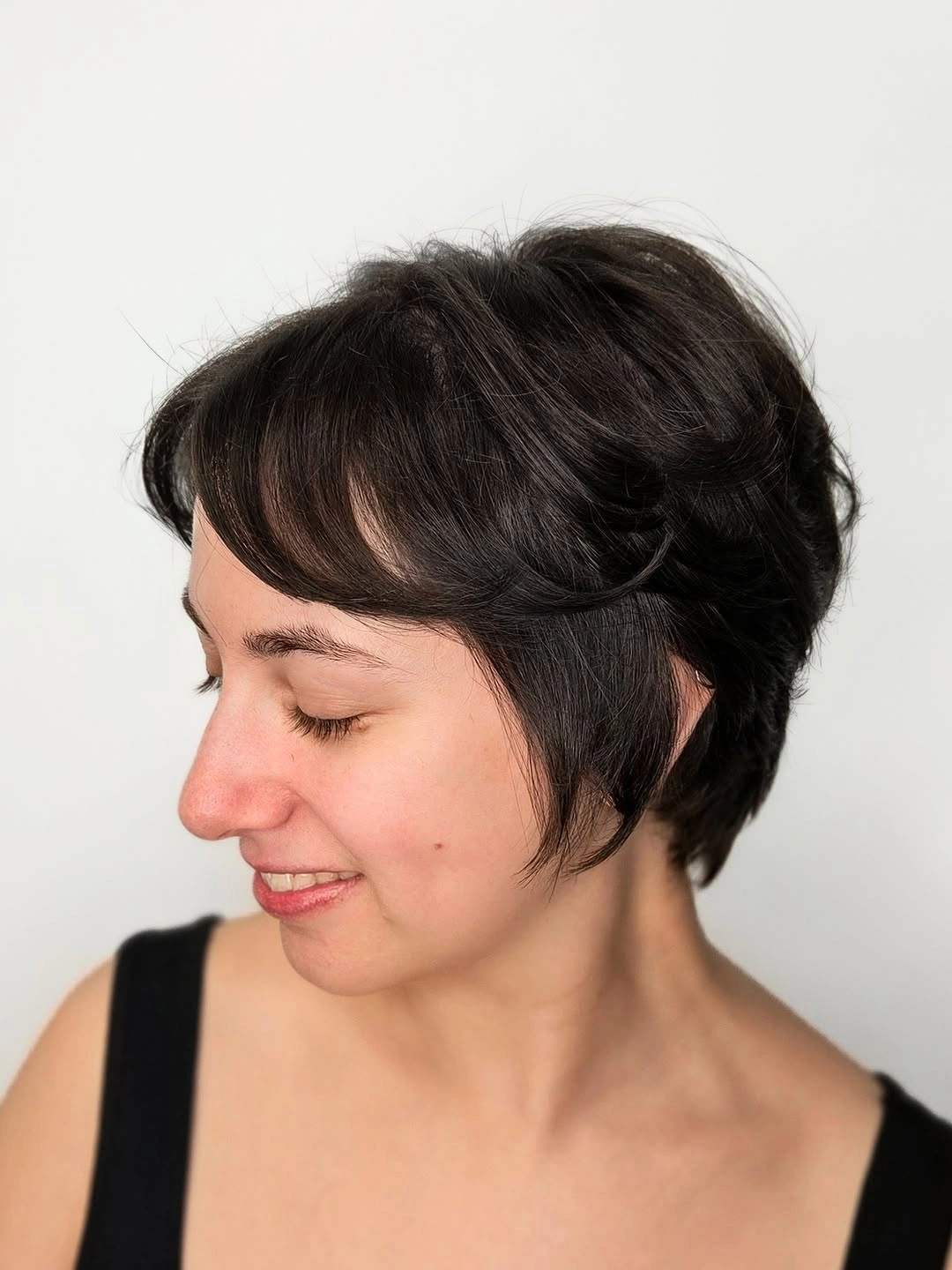 Fall hairstyles for short hair 2026 Layered Pixie Bob With Soft Curtain Fringe