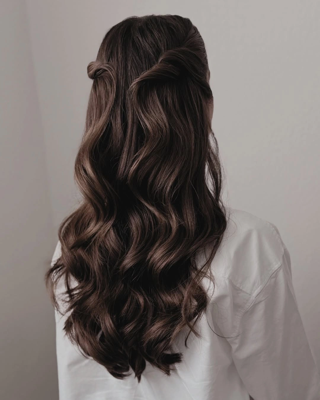 Fall hairstyles for wedding guests 2026 Classic Half-Up Waves with Luxurious Gloss