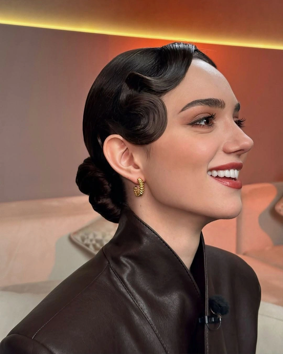 Fall hairstyles for wedding guests 2026 Vintage Hollywood Sleek Bun with Sculpted Waves