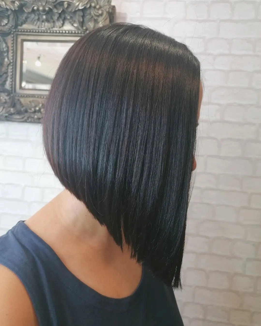 fall medium haircuts 2026 Precision Angled Bob with Mirror Shine