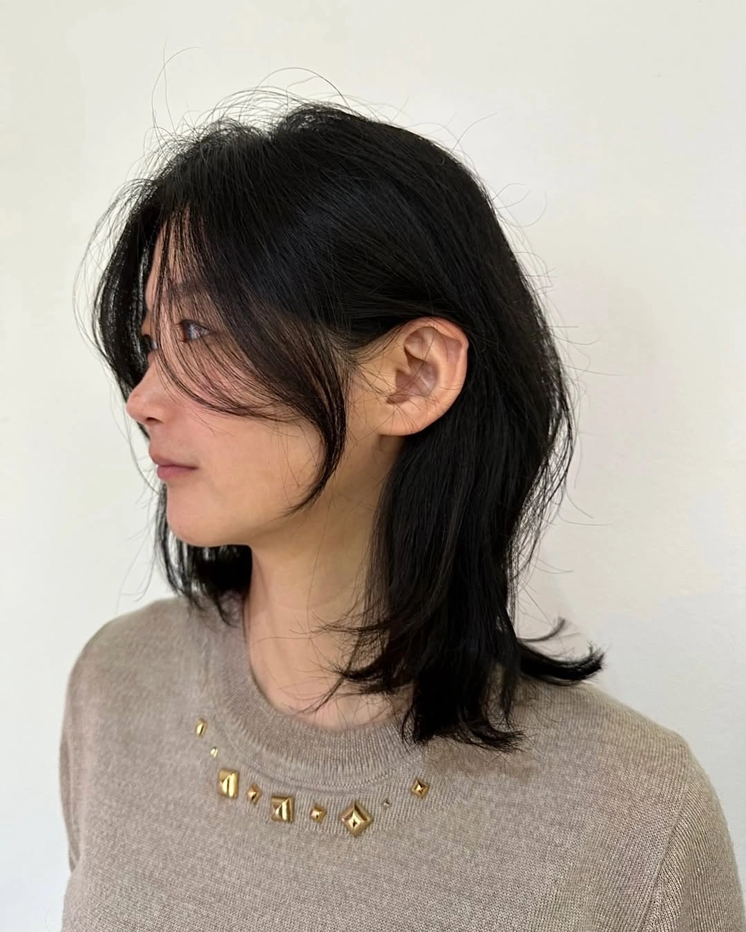 fall medium haircuts 2026 Airy Layered Cut with Wispy Curtain Fringe