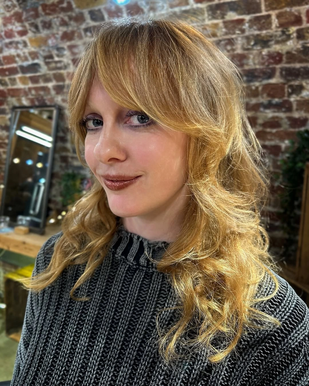 fall medium haircuts 2026 Layered Butterfly Waves with Curtain Fringe