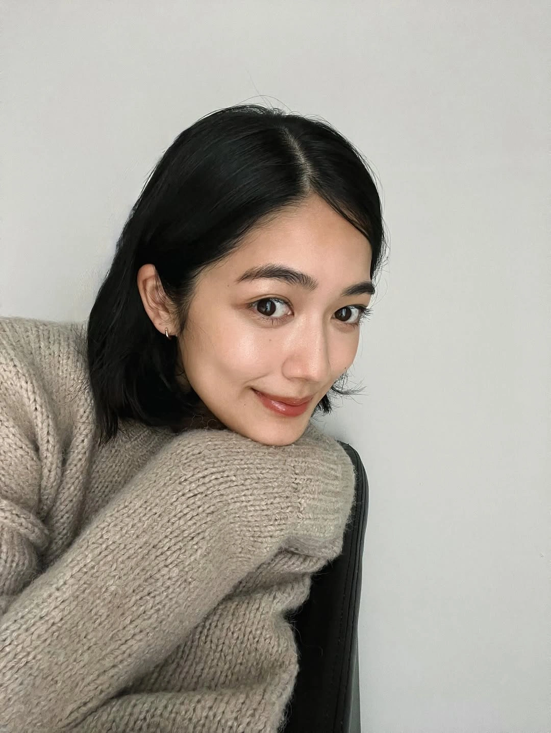 fall medium haircuts 2026 Minimal Chin-Length Bob with Tucked Ends