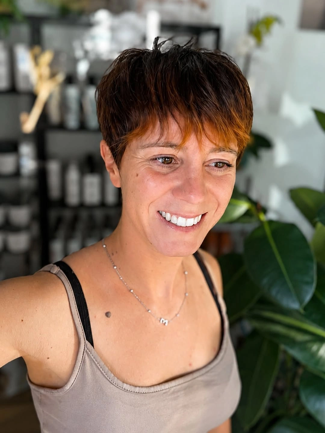 fall pixie haircut ideas 2026 Soft Brunette Pixie With Warm Caramel Accents