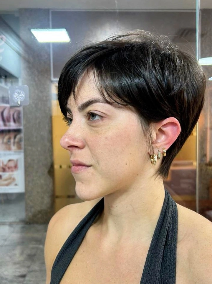 fall pixie haircut ideas 2026 Classic Sleek Pixie With Soft Feminine Layers
