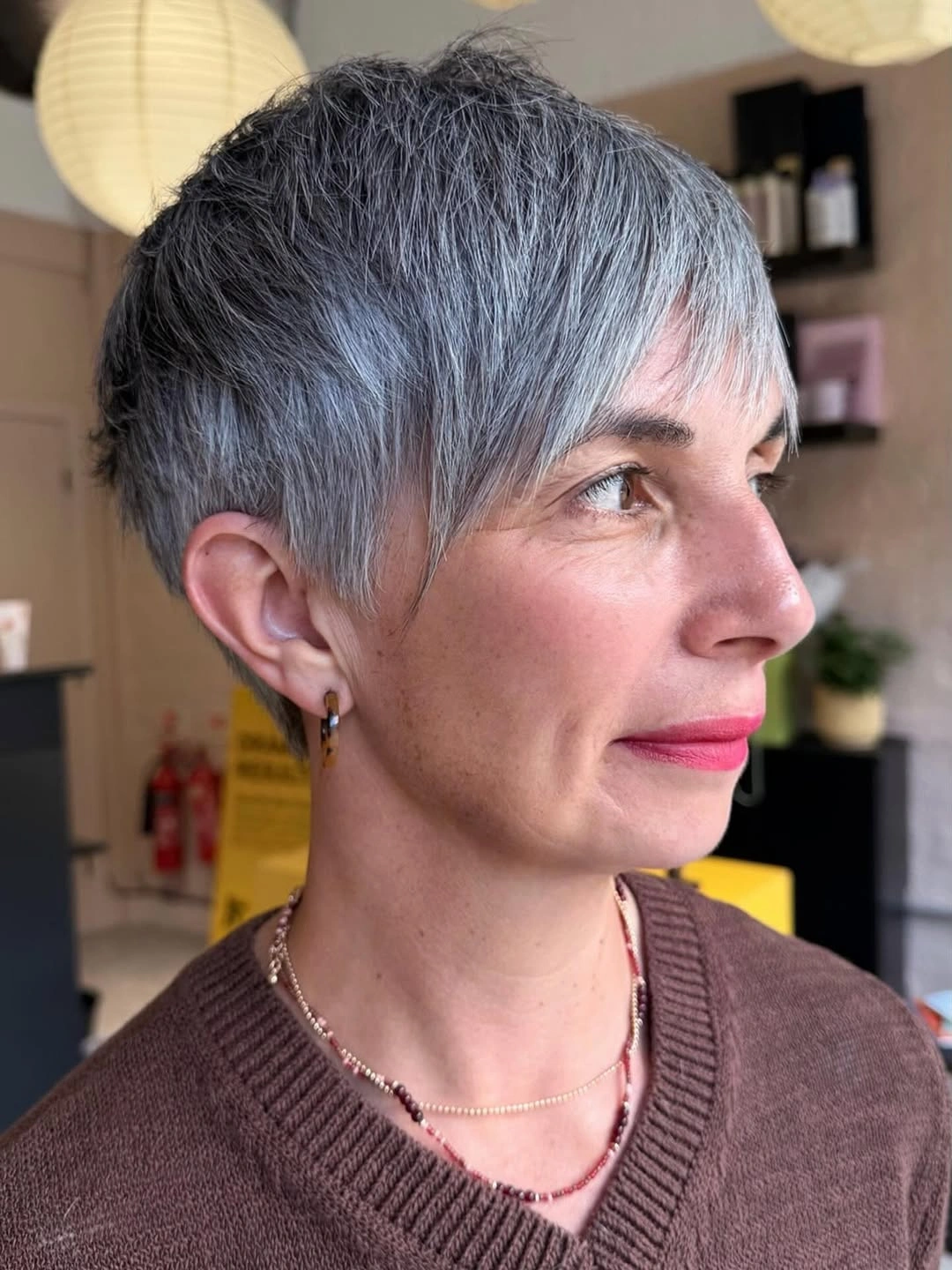 fall pixie haircut ideas 2026 Elegant Silver Pixie With Graceful Side Fringe