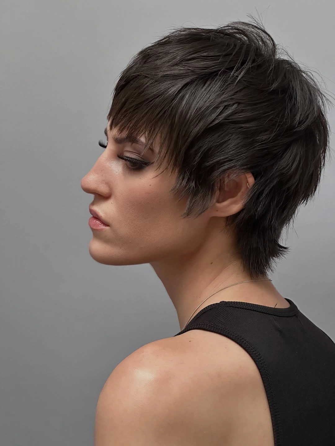 fall pixie haircut ideas 2026 Layered Pixie Mullet With Modern Edge